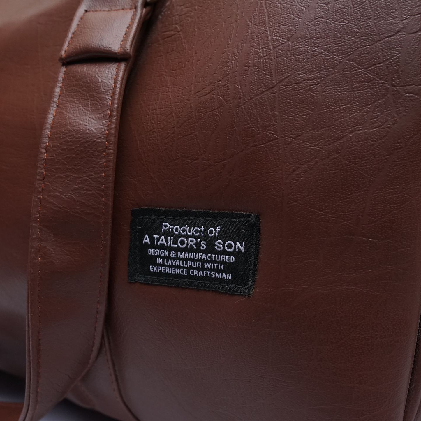 Brown duffle bag