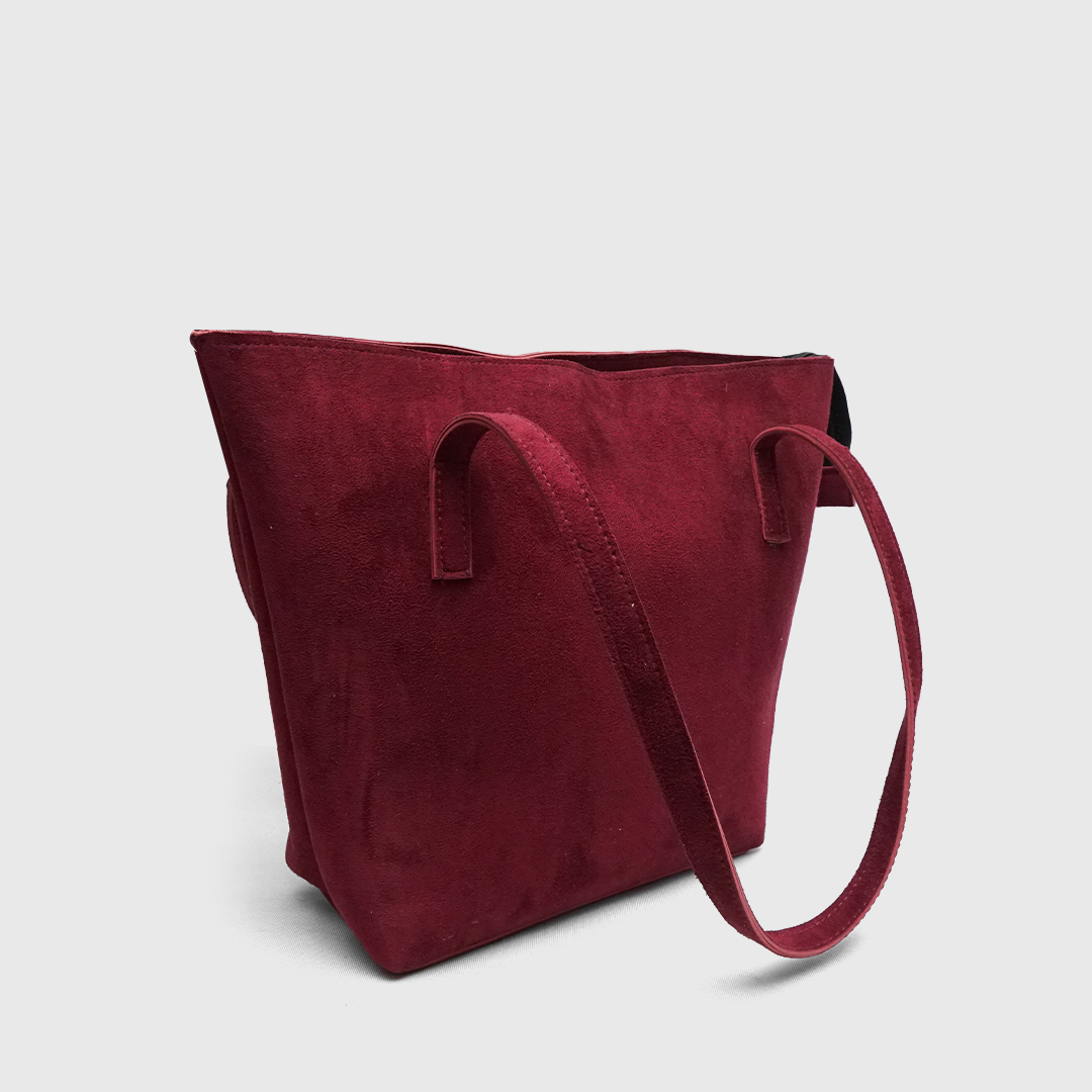 Back view of maroon suede tote handbag with shoulder straps