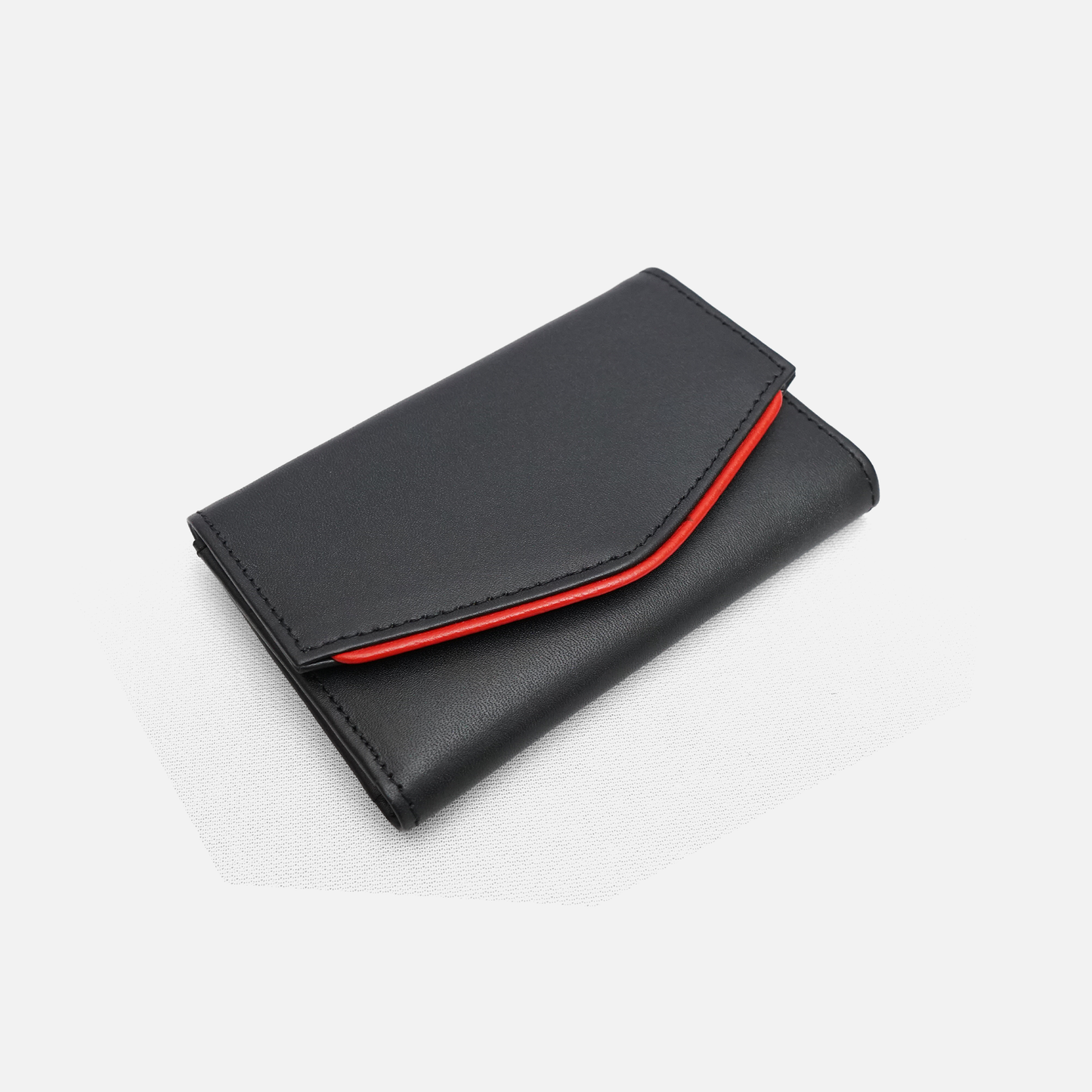 Black edge wallet clutch with red accent minimalist design