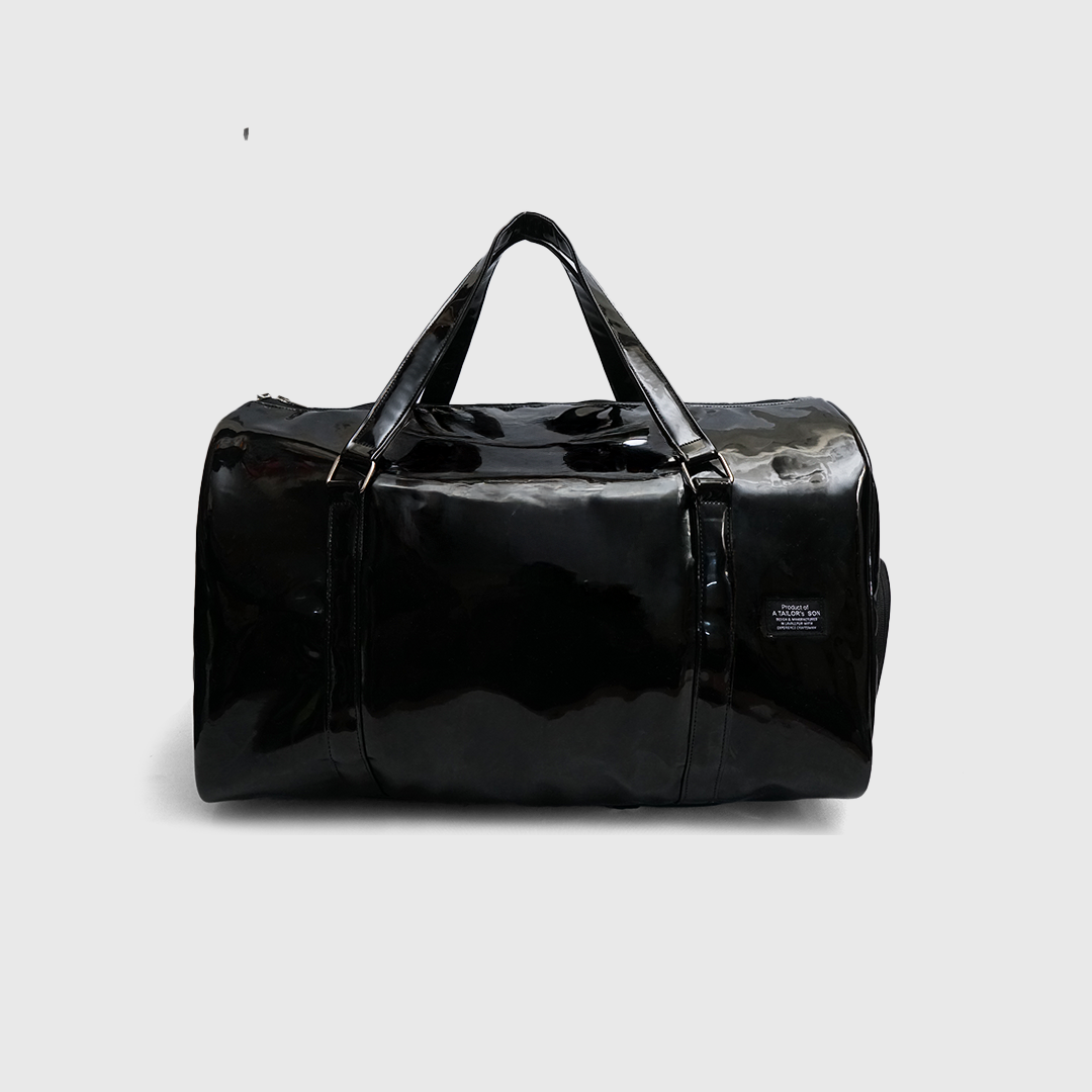 Black patent duffle bag with glossy finish