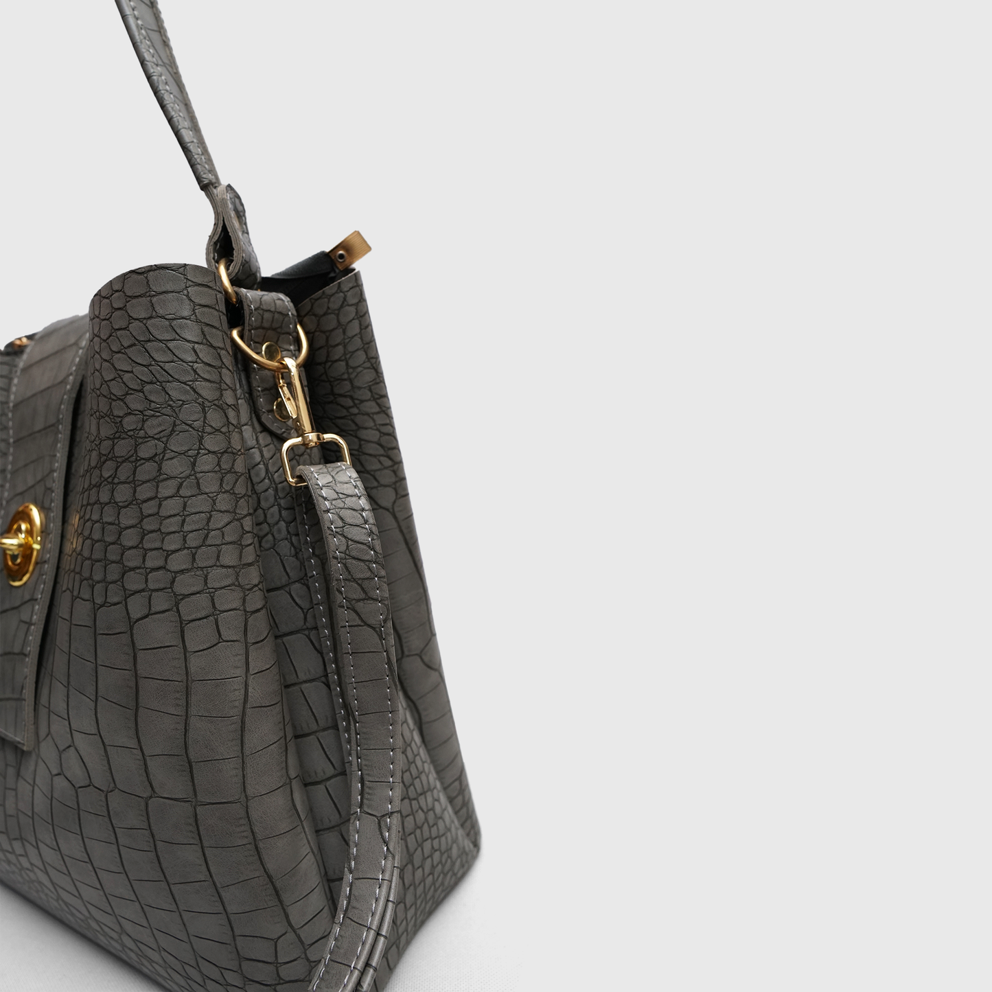 Close-up of crocodile embossed rexine handbag texture
