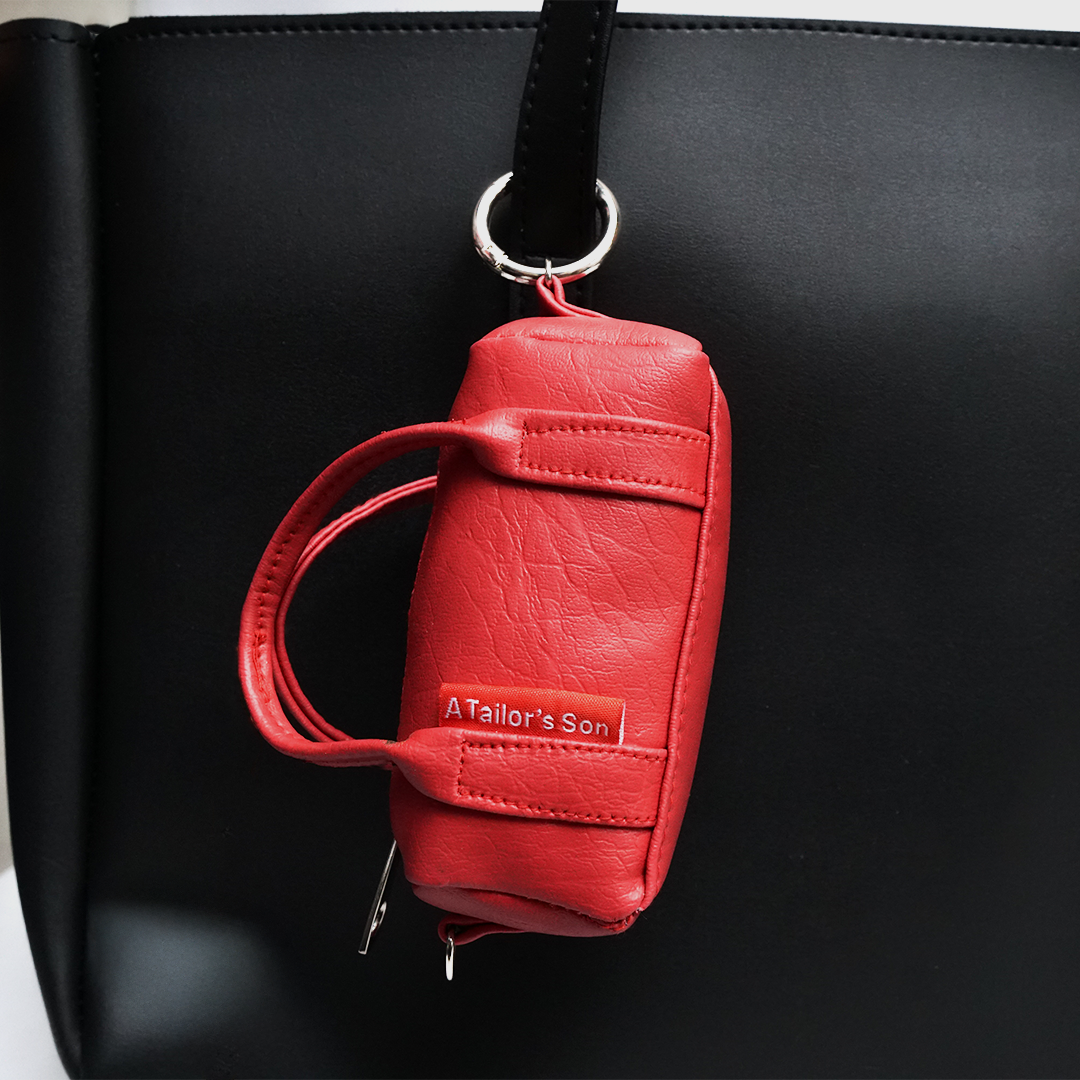 Faux leather mini duffle keychain pouch
