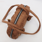 Interior compartment of suede shoulder bag