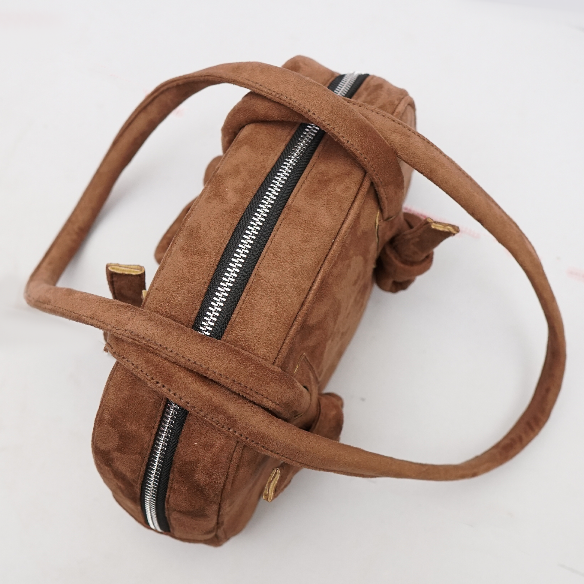 Interior compartment of suede shoulder bag