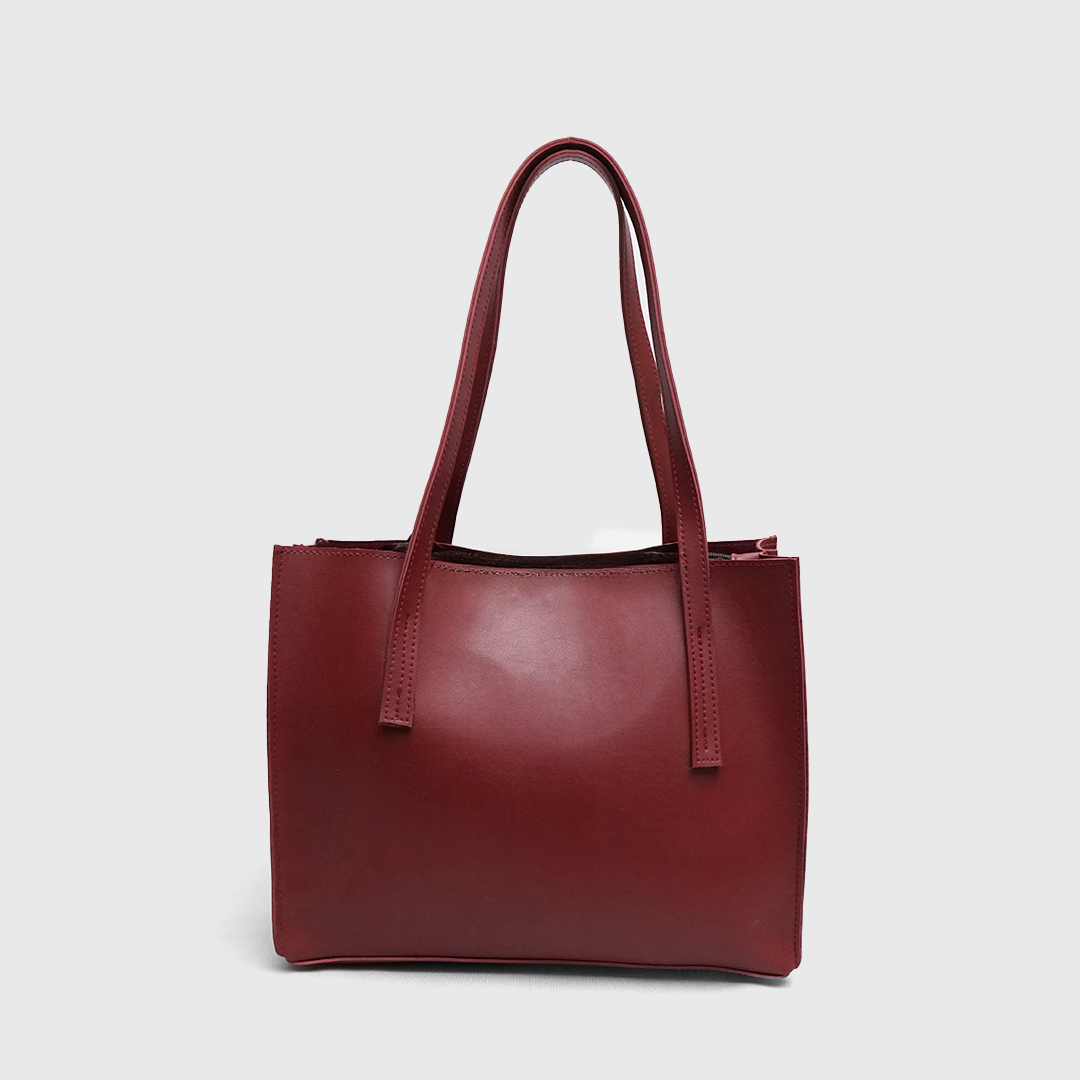 Interior zip compartment organizer inside maroon tote bag