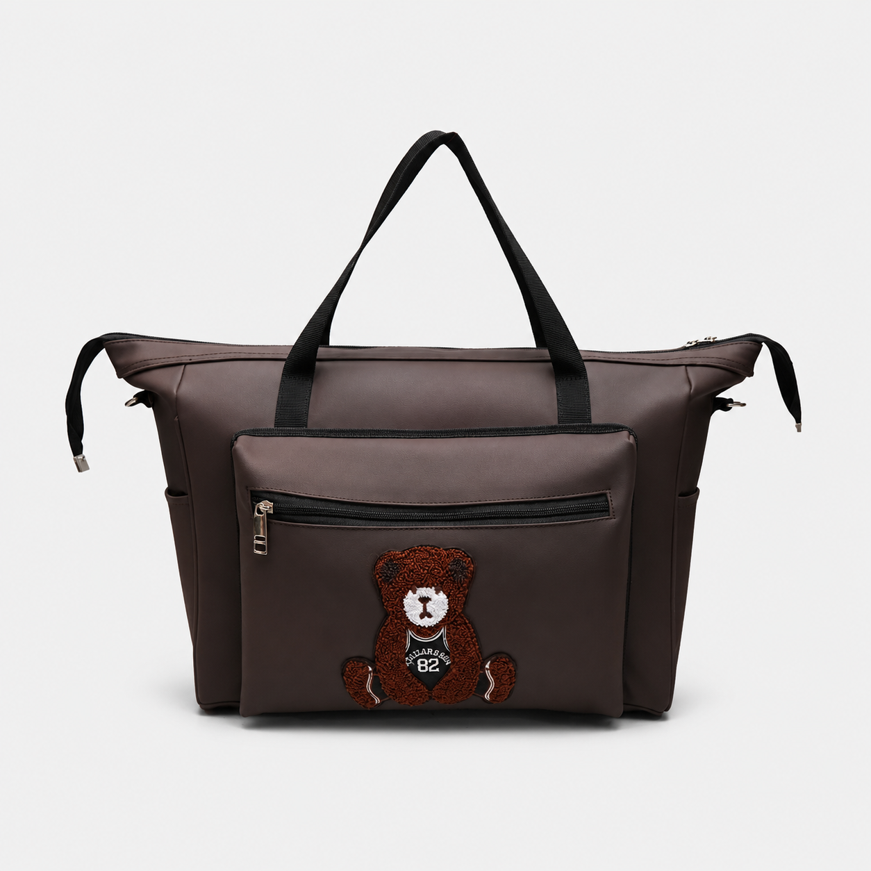 Large brown baby tote bag with dual handles, durable faux leather construction, and cute teddy bear detail suitable for mothers and travel use.