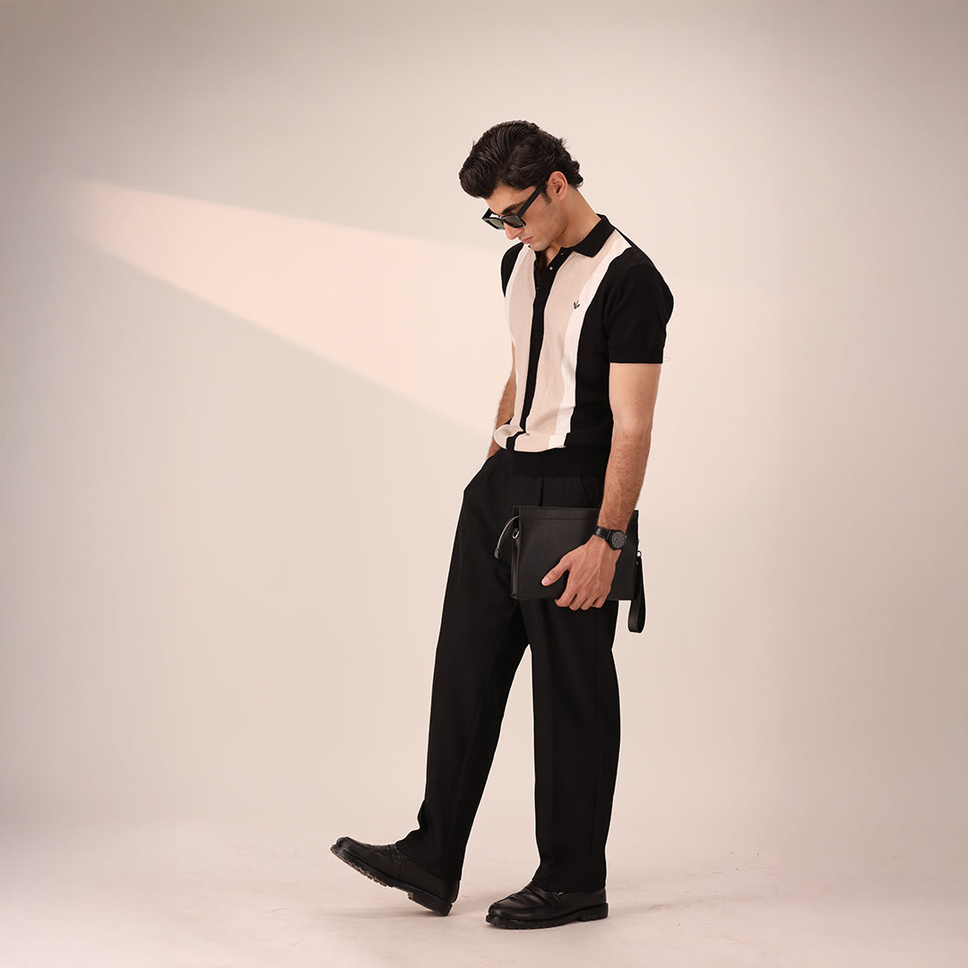 Luxury men's black clutch pouch with wrist strap for office, travel, and daily essentials.