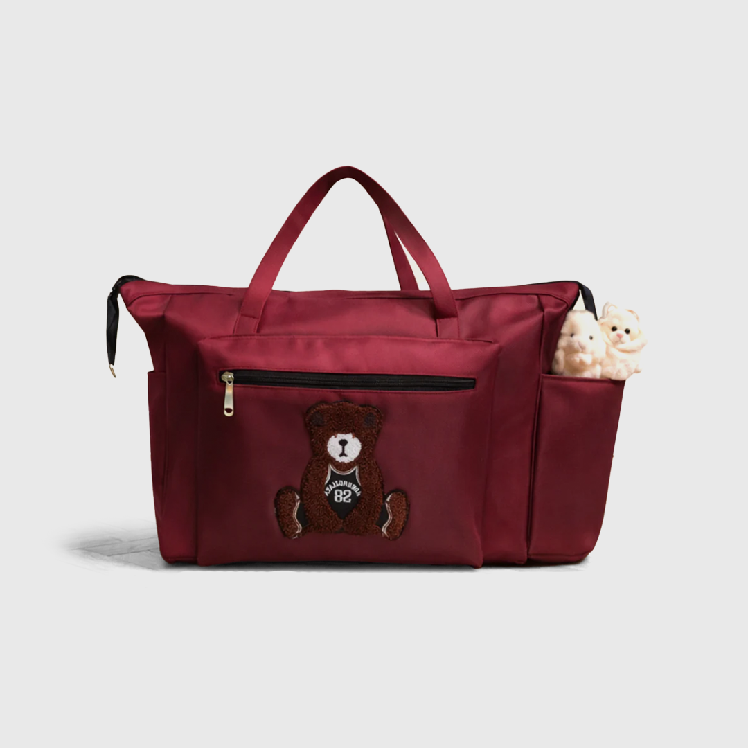 Maroon baby diaper bag front view with teddy patch
