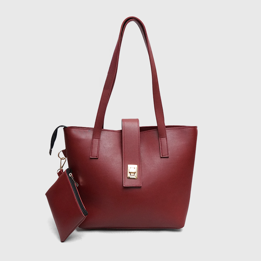 Maroon royal tote bag made from faux leather with gold lock detail