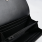 Minimal black wallet with card slots and zip pocket