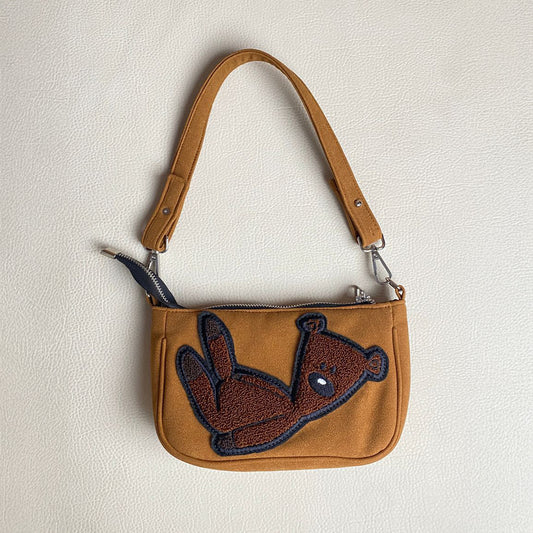 Mr Bean Shoulder Hand Bag by A Tailor Son featuring a compact unisex design with adjustable shoulder strap, premium rexine material, secure zip closure, and stylish everyday carry look suitable for casual outings, travel, and daily use. Minimal aesthetic with practical storage for phone, wallet, keys, and essentials.