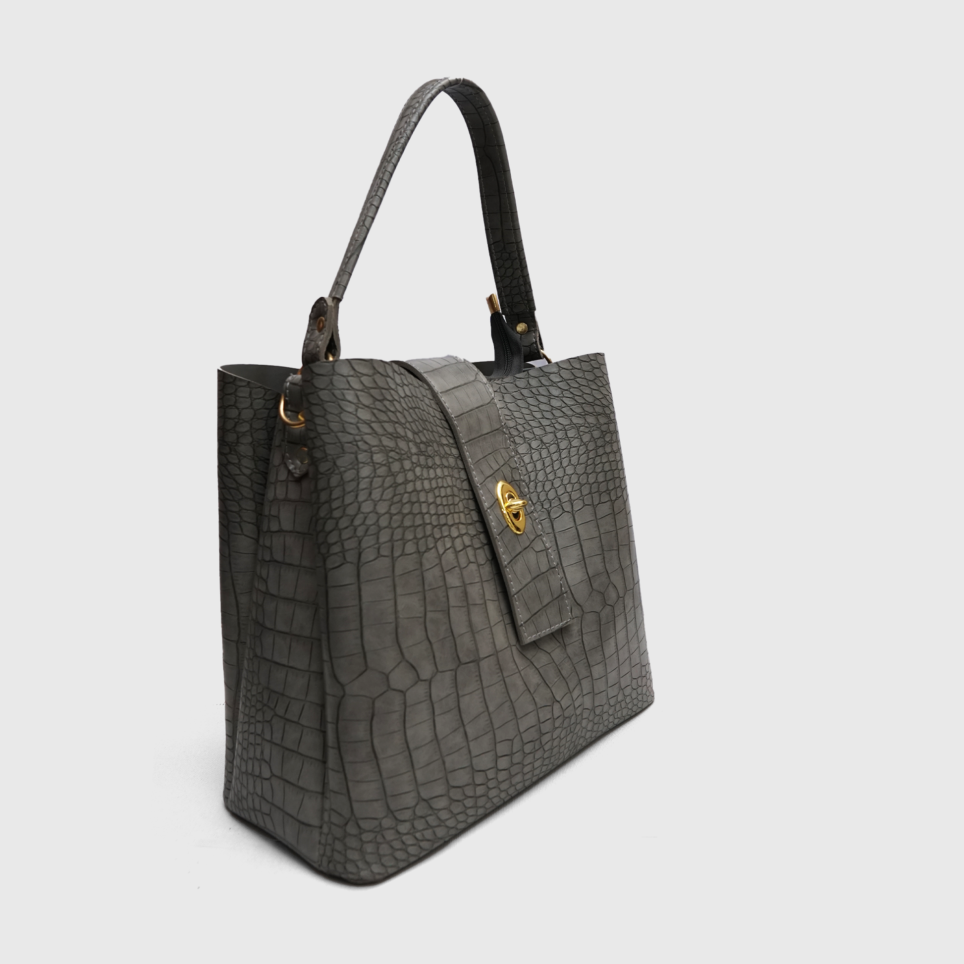 Side angle view of premium grey croc texture handbag