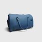 Side pocket detail of blue gym duffle bag