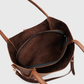 Side profile of premium brown rexine tote bag for women