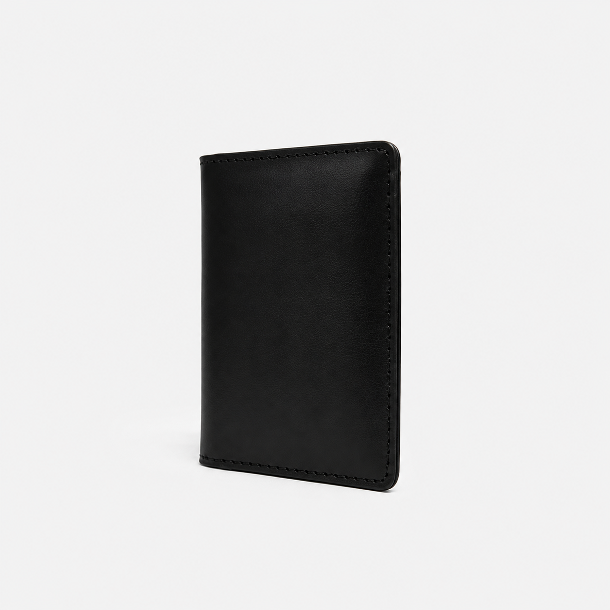 Slim black card holder wallet for men with genuine leather finish, lightweight pocket-friendly design, and modern minimalist style.