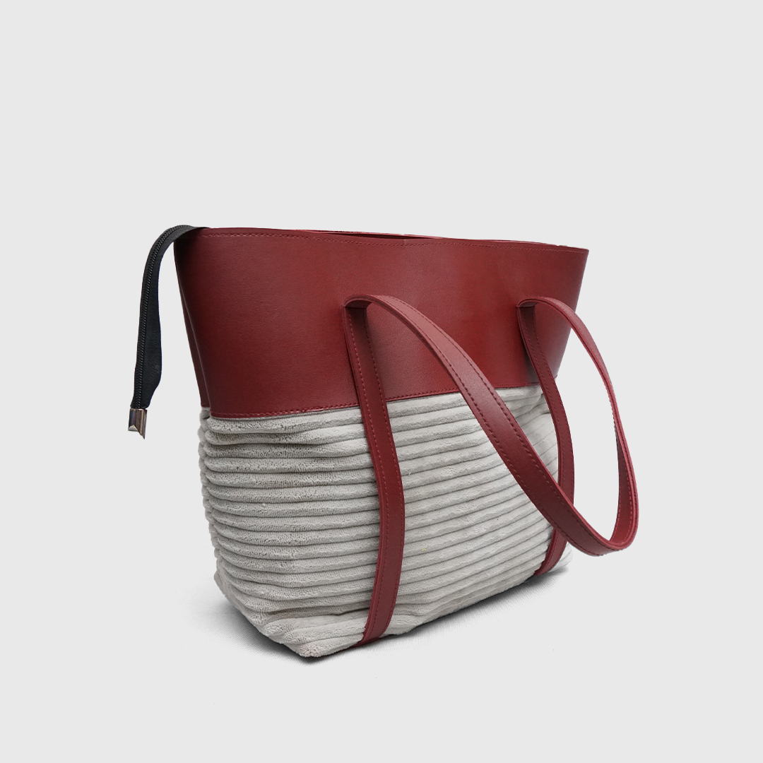 Spacious interior of burgundy tote bag