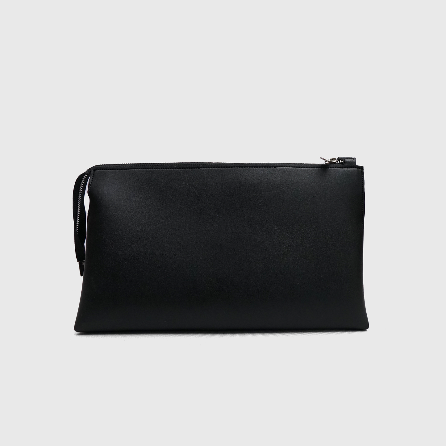 Stylish women’s black rexine clutch pouch with modern minimalist aesthetic