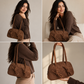 Top zipper view of aesthetic suede purse