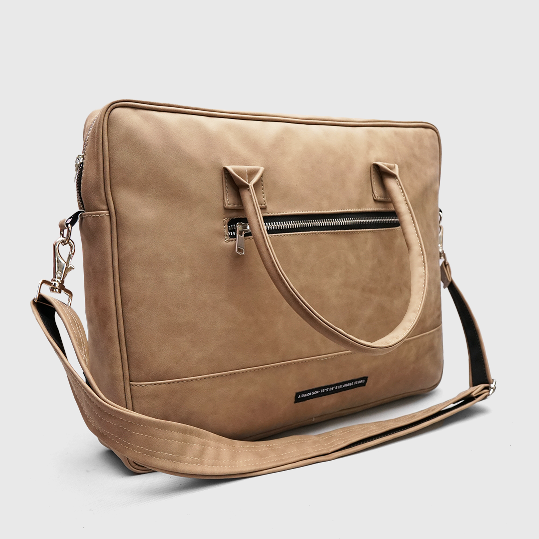 beige laptop bag close up zipper and material texture