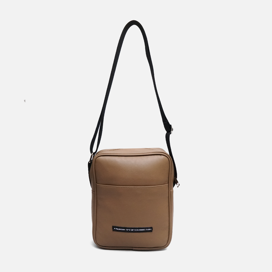 camel crossbody bag minimal leather sling bag front view