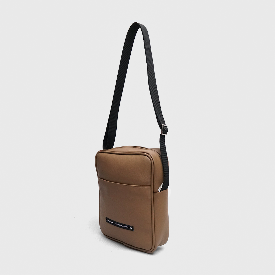 camel leather crossbody bag adjustable strap side view