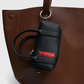 faux leather mini duffle bag charm