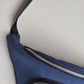 Our navy croissant fanny bag is built for long walks, crowded places, and daily essentials — mak

